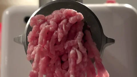 Minced Meat being made in the shredder Stock Footage 239673755