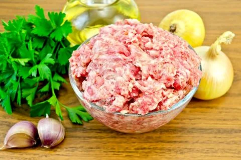 Minced meat on the board Stock Photos