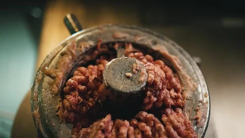 Minced meat crawls out the meat grinder 스톡 동영상 244322491