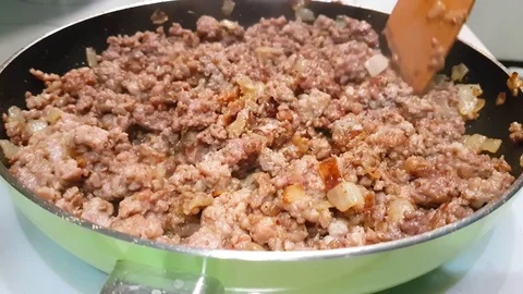 Minced meat fried in a frying pan Video stock 83447251
