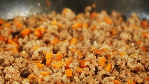 Minced meat fried in a frying pan Stock Footage 124418012
