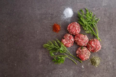 Minced meat on a grey background Stock Photos