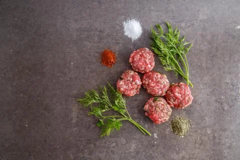 Minced meat on a grey background Stock Photos