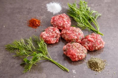 Minced meat on a grey background Stock Photos