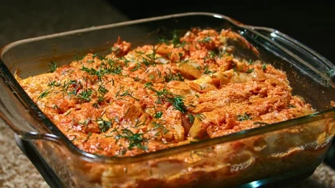 Minced meat stew in cabbage leaves, in the form and on a plate, play with light Stock Footage 153801771