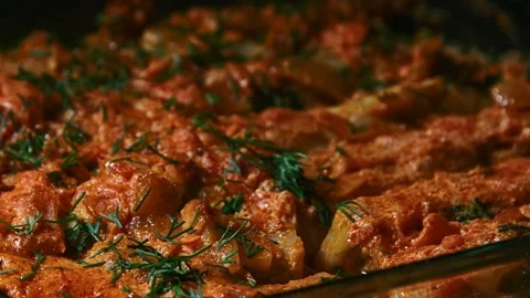 Minced meat stew in cabbage leaves, in the form and on a plate, play with light Stock Footage 153802022