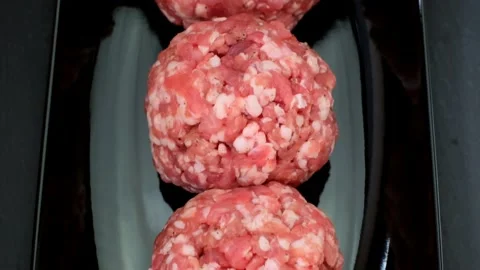 Minced pork. Round balls of minced pork Stock Footage 144065448