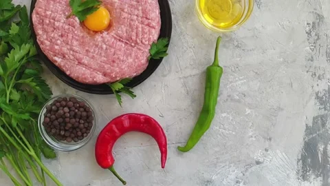Minced raw on a concrete background Stock Footage 130639556