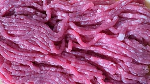 Minced raw pork meat creating a texture for cooking Stock Photos