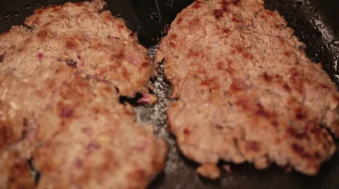 Minced steak just fried in hot pan - closeup Stock Footage 45983475