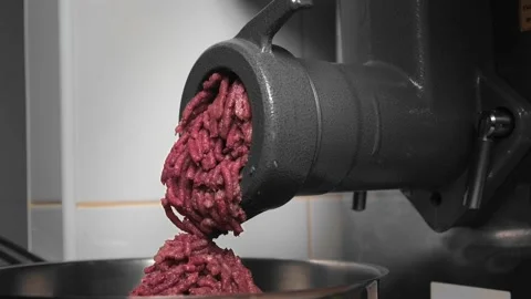 Mincemeat falls down from outdated meat grinder in shop 스톡 동영상 157874156