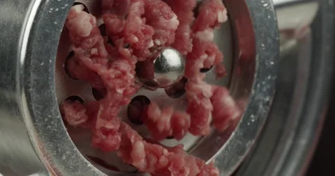 Mincing ground beef with a meat grinder closeup Stock Footage 145146513