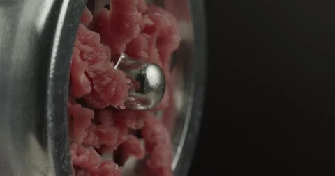 Mincing ground beef with a meat grinder closeup 動画素材 151769209