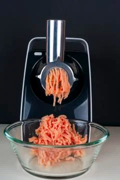 Mincing machine and meat. preparation of minced raw meat Stock Photos