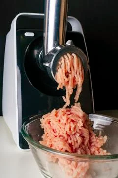 Mincing machine and meat. preparation of minced raw meat Stock Photos