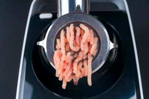 Mincing machine and meat. preparation of minced raw meat Stock Photos