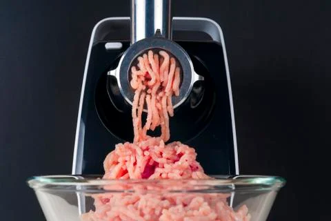 Mincing machine and meat. preparation of minced raw meat Stock Photos