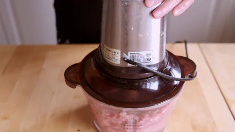 Mincing Meat With Blender - Close Up Stock Footage 244959231