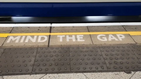 Mind The Gap Sign: Metro in Central London Video stock 128637422