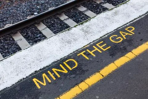 Mind the gap sign Stock Photos
