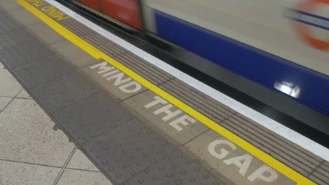 Mind The Gap Warning On Platform in London Underground Stock Footage 154142143