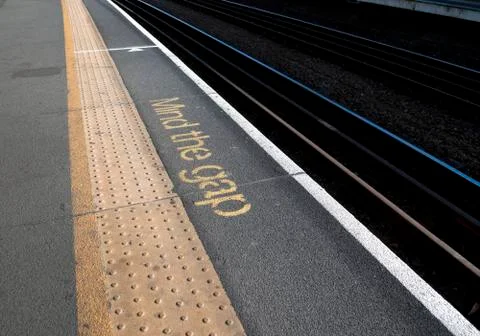 Mind the Gap warning on Station Platform Stock Photos