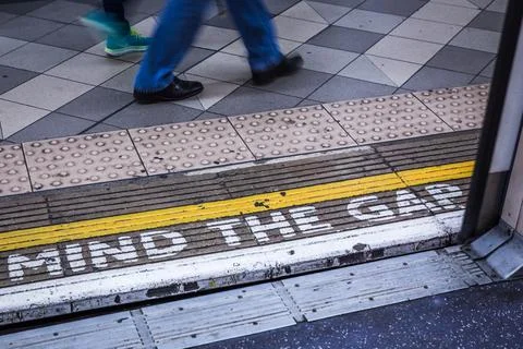 Mind the gap wording Stock Photos