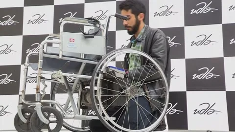 Mind-powered wheelchair is perfected in Ecuador, Quito, EC - 25 Apr 2022 Stock Footage 204126053