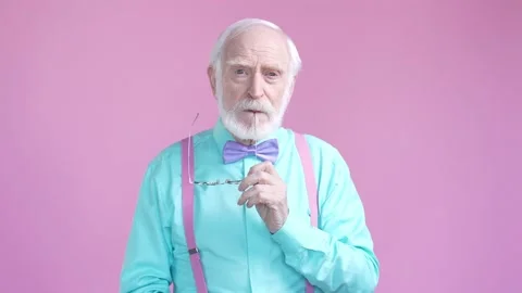Minded aged man think great suggestion isolated pastel color background Stock Footage 190911630