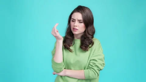 Minded interested lady confused deep thought isolated cyan color background Stock Footage 169944395
