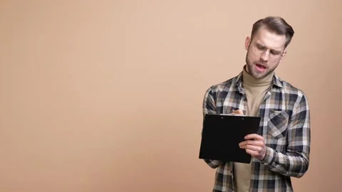 Minded smart guy prepare review document isolated pastel color background Stock Footage 176805982