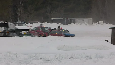Minden, Canada Jan 12 2026 Ice Racing Cars Drifting on Frozen Track in Winter Stock Footage 346399974