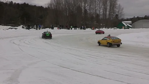 Minden, Canada Jan 12 2026 Ice Racing Cars Drifting on Frozen Track in Winter Stock Footage 346439524