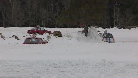 Minden, Canada Jan 12 2026 Ice Racing Cars Drifting on Frozen Track in Winter Stock Footage 346439935