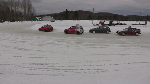 Minden, Canada Jan 12 2026 Ice Racing Cars Drifting on Frozen Track in Winter Stock Footage 346442918