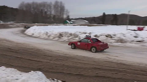 Minden, Canada Jan 12 2026 Ice Racing Cars Drifting on Frozen Track in Winter Stock Footage 346443899