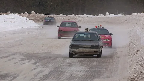 Minden, Canada Jan 12 2026 Ice Racing Cars Drifting on Frozen Track in Winter Stock Footage 346444121