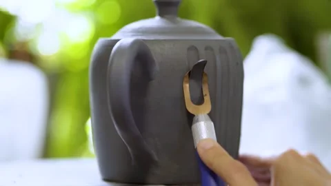 Mindful clay carving process Stock Footage 309280576