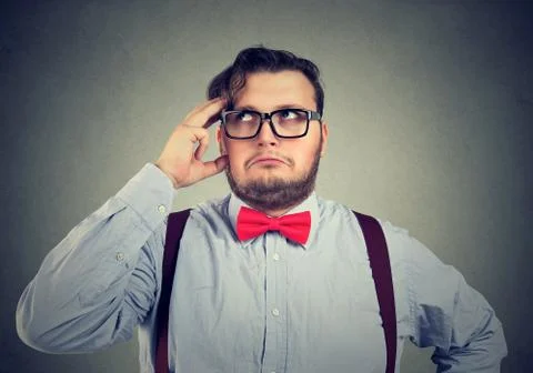 Mindful man solving a problem thinking of solution Stock Photos