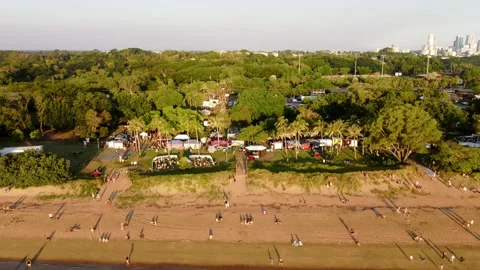 Mindil Markets Darwin Aerials zoom out from beach Stock Footage