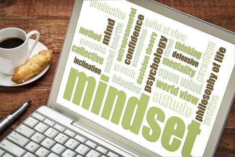 Mindset word cloud on laptop mindset word cloud on a laptop with a cup of ... Fotos Stock