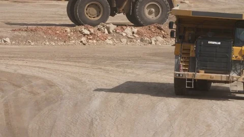 Mine dump trucks Stock Footage 81733194