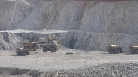 Mine dump trucks working Stock Footage 81733430