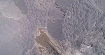 Mine dumps viewed from the sky producing interesting bumpy textures aerial 4K Stock Footage 85954613