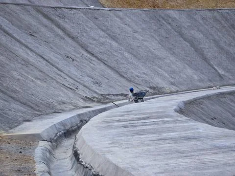 Mine slope stabilization process with geosynthetics and shotcrete Stock Photos