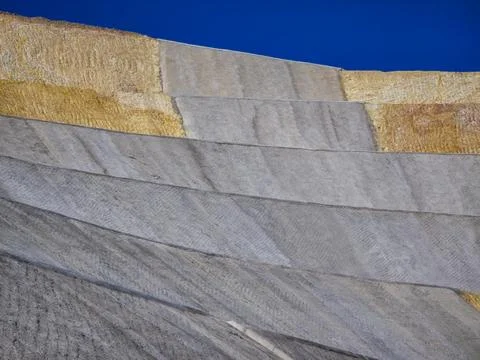 Mine slope stabilization process with geosynthetics and shotcrete Stock Photos