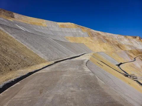 Mine slope stabilization process with geosynthetics and shotcrete Stock Photos
