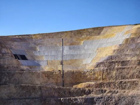 Mine slope stabilization process with geosynthetics and shotcrete Stock Photos