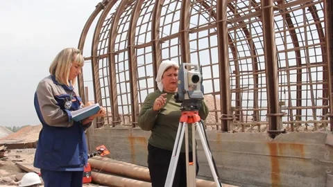 Mine surveyors work on the construction of a coal mine Stock Footage 85694804