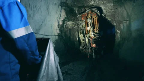Mine worker is operating a boring machine 動画素材 150818627